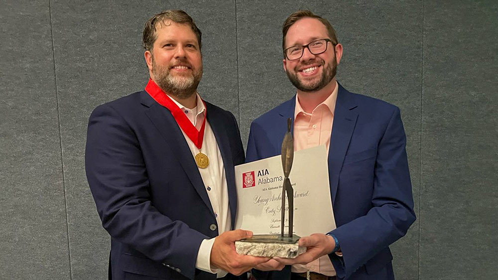 Cody Smith receives Young Architect Award from J. Barrett Penney, President, AIA Alabama